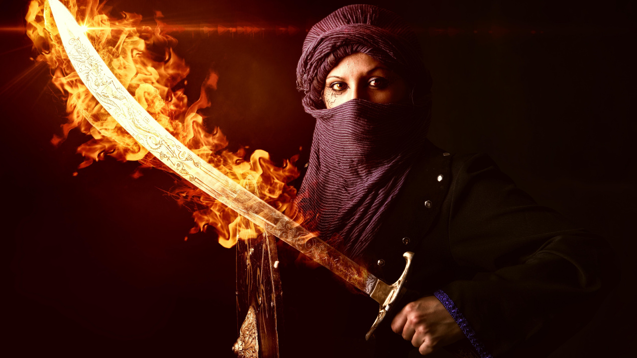 Person in Black Hoodie Holding Fire. Wallpaper in 1280x720 Resolution