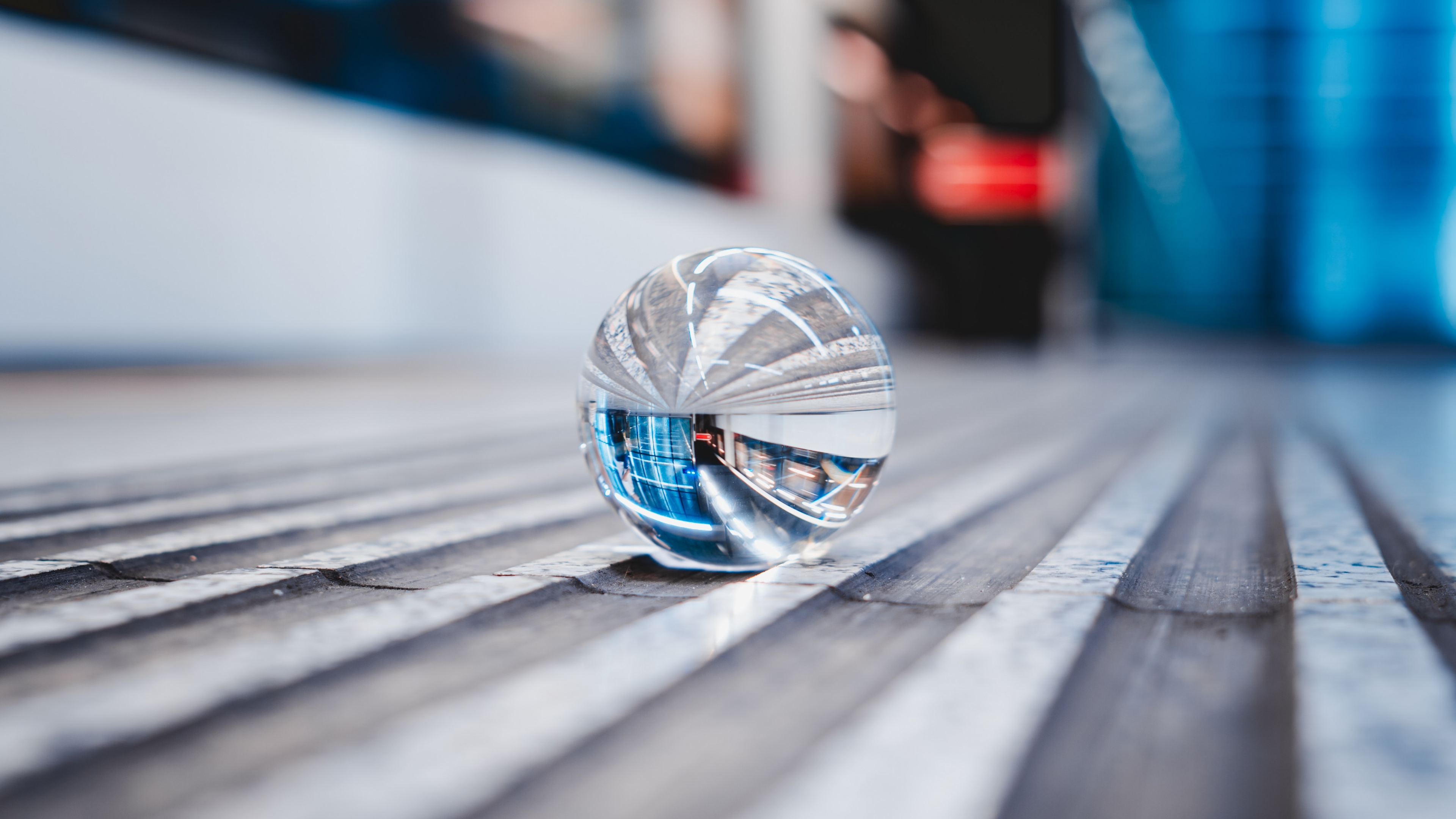Clear Glass Ball on Gray Wooden Plank. Wallpaper in 3840x2160 Resolution
