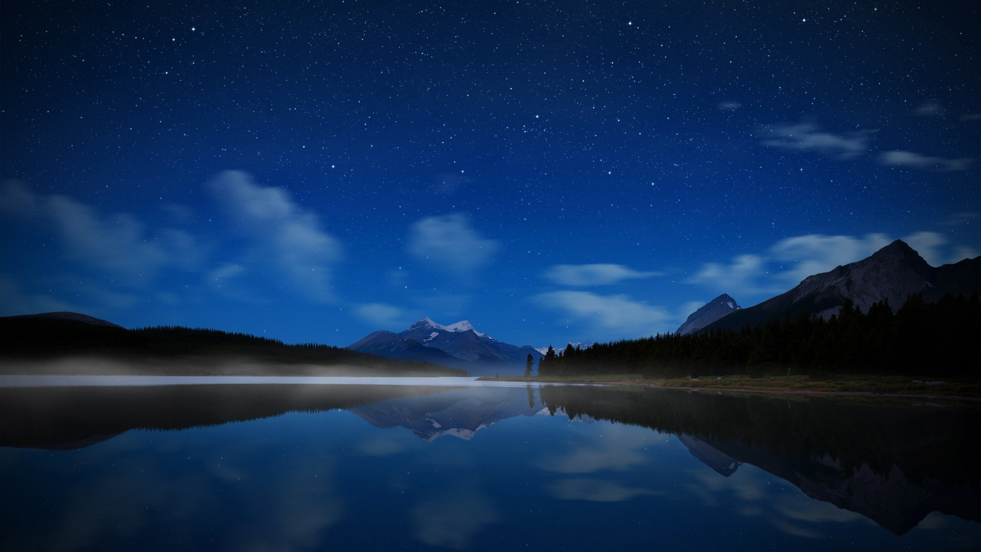 Body of Water Near Mountain Under Blue Sky During Night Time. Wallpaper in 1920x1080 Resolution