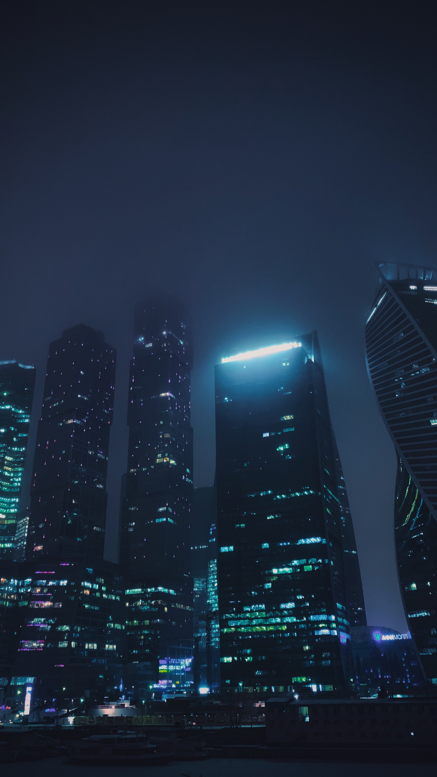 Immeubles de Grande Hauteur Pendant la Nuit. Wallpaper in 1440x2560 Resolution