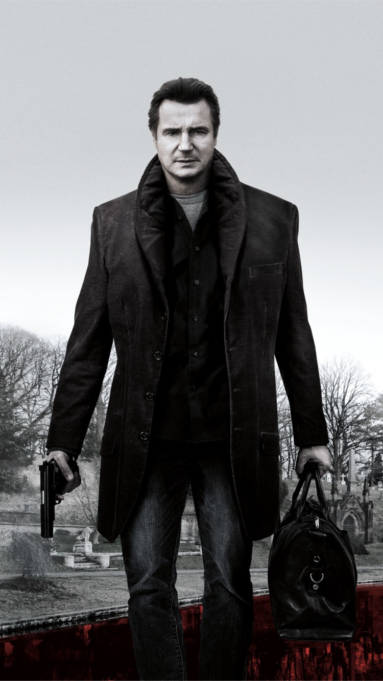 Homme en Costume Noir Debout Sur un Banc en Béton Rouge. Wallpaper in 750x1334 Resolution