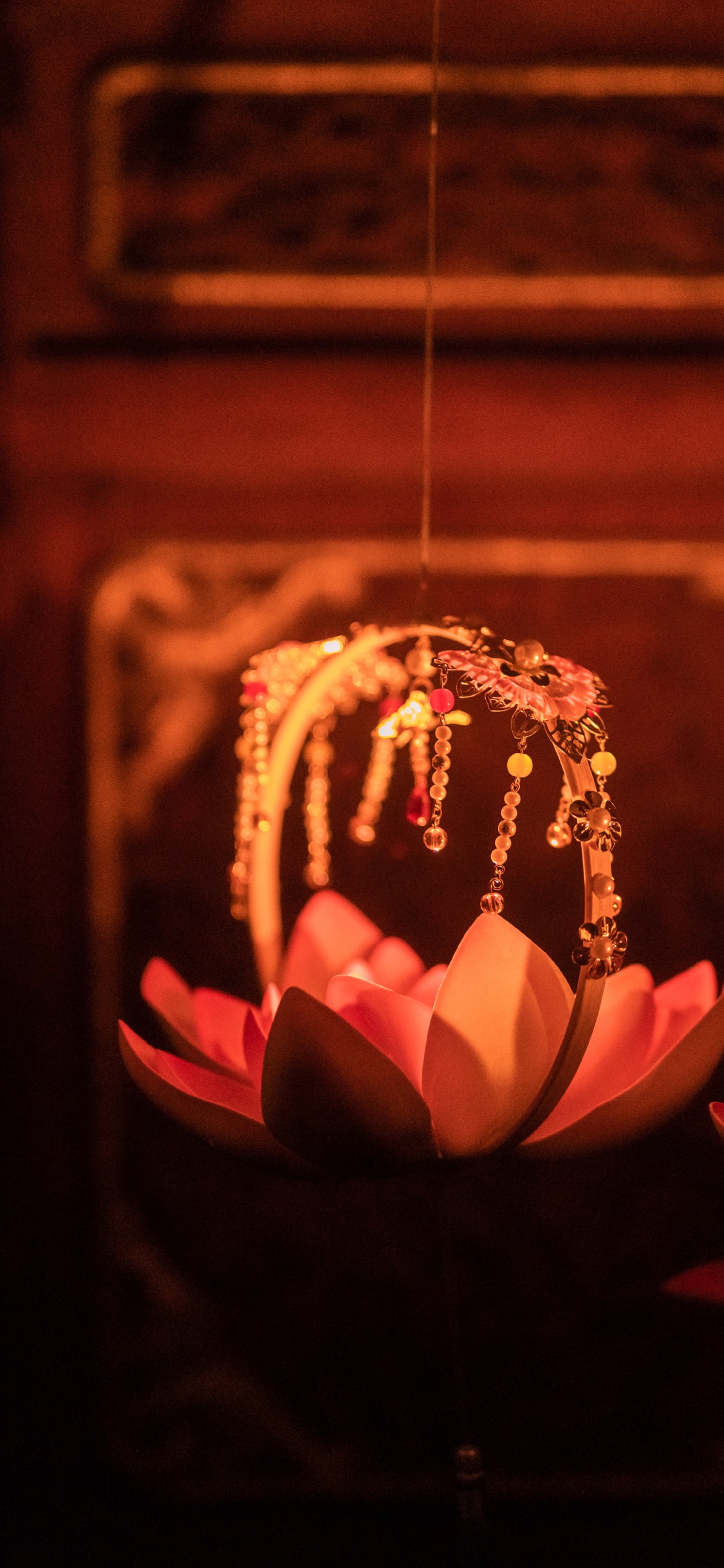 Pink and Brown Hanging Decor. Wallpaper in 1125x2436 Resolution