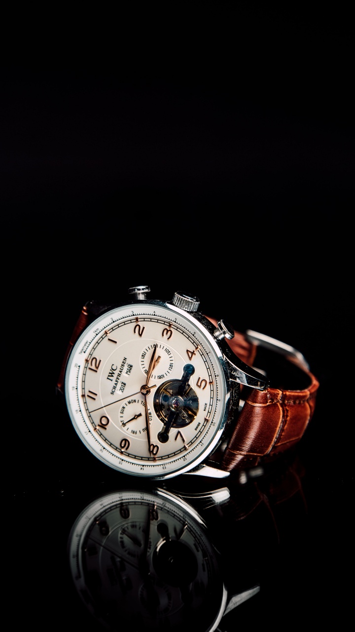 Silver and Red Chronograph Watch. Wallpaper in 720x1280 Resolution