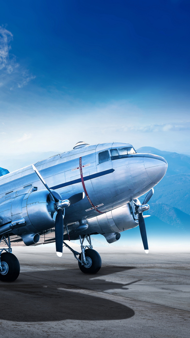 Avión Azul en el Aeropuerto Durante el Día. Wallpaper in 750x1334 Resolution