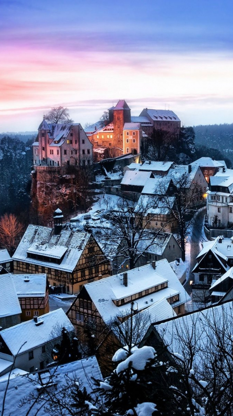 White and Brown Houses Near Mountain Under Cloudy Sky During Daytime. Wallpaper in 750x1334 Resolution