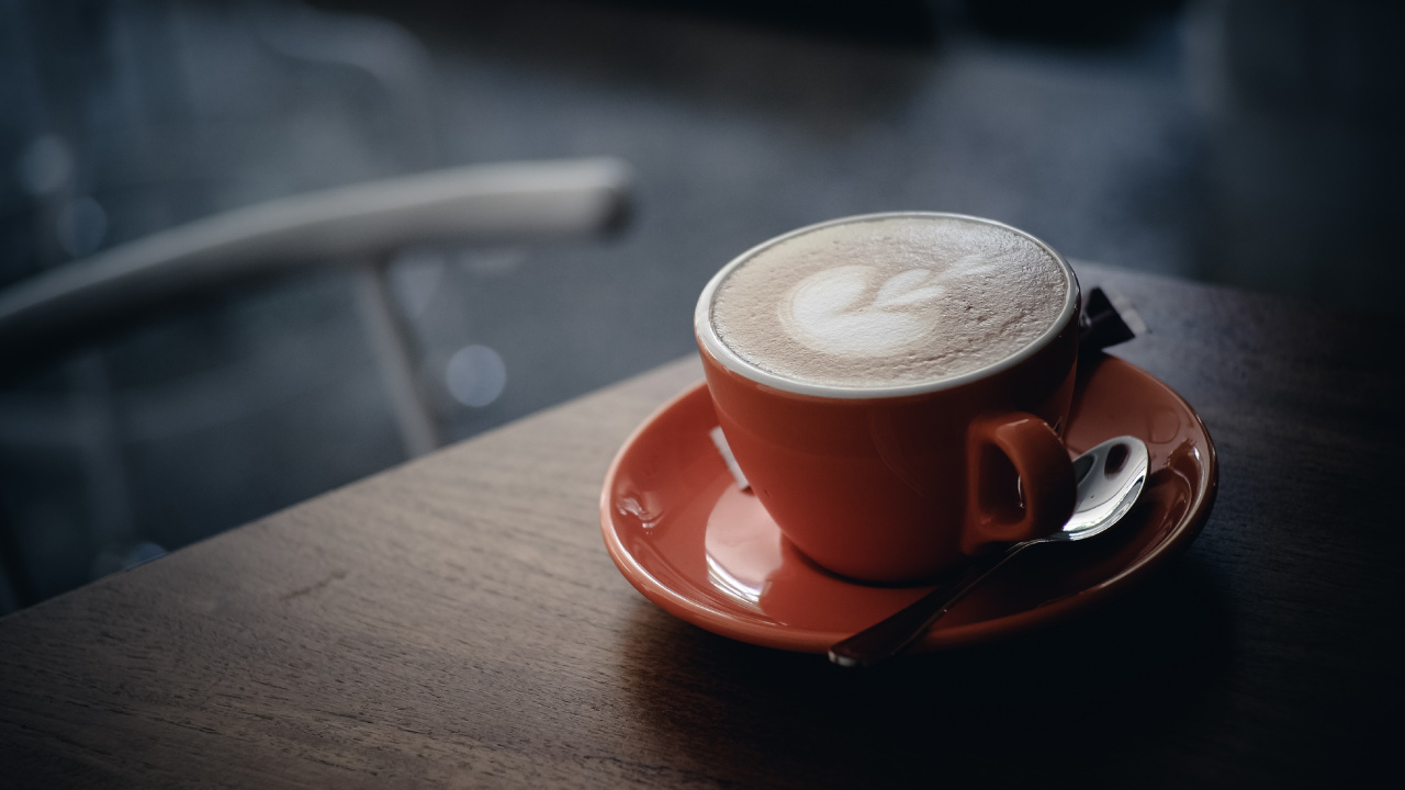 Red Ceramic Mug With Coffee on Orange Saucer. Wallpaper in 1280x720 Resolution