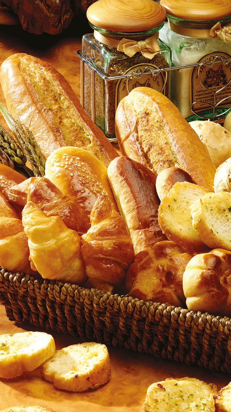 Bread on Brown Woven Tray. Wallpaper in 750x1334 Resolution