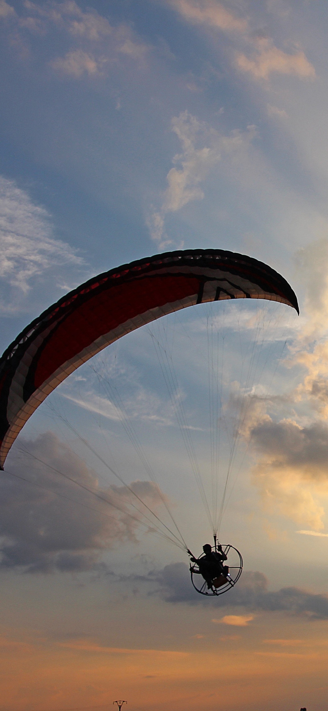 Person in Parachute Under Cloudy Sky During Daytime. Wallpaper in 1242x2688 Resolution