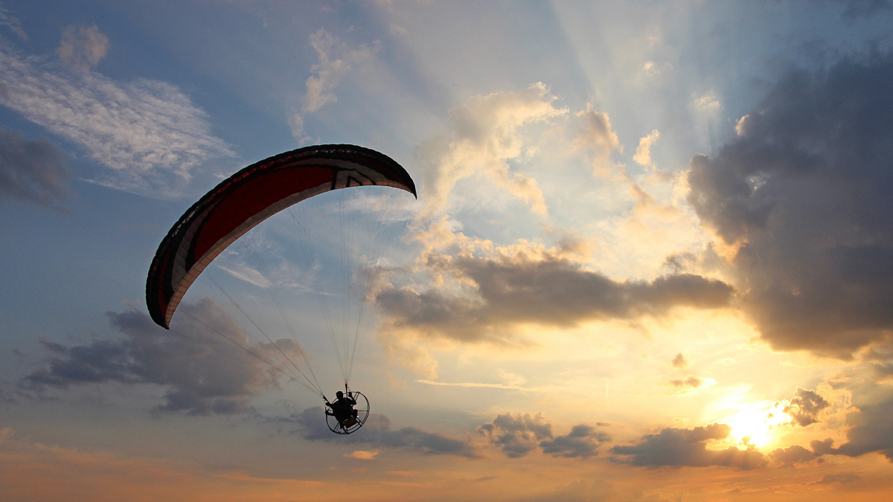 Person in Parachute Under Cloudy Sky During Daytime. Wallpaper in 1280x720 Resolution