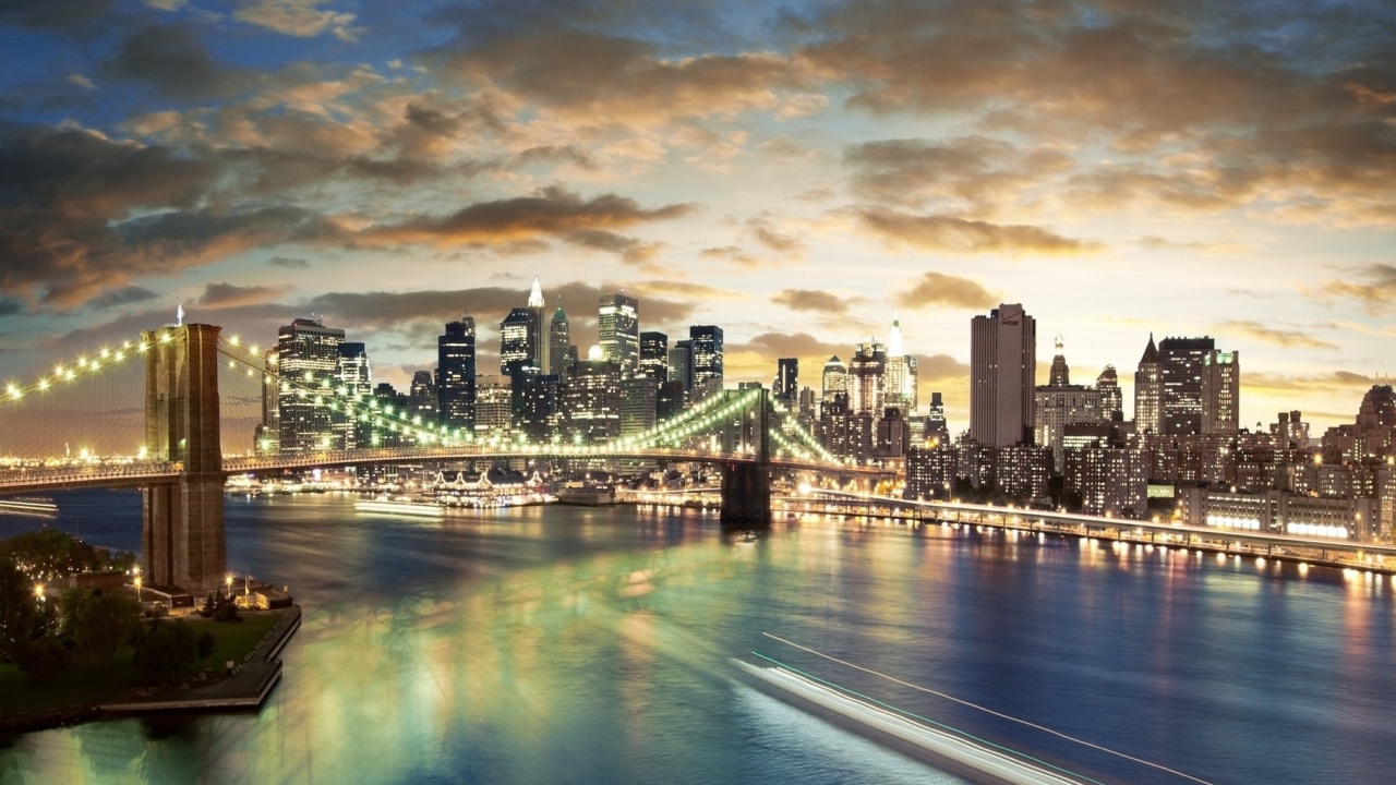 City Skyline Across Body of Water During Night Time. Wallpaper in 1280x720 Resolution