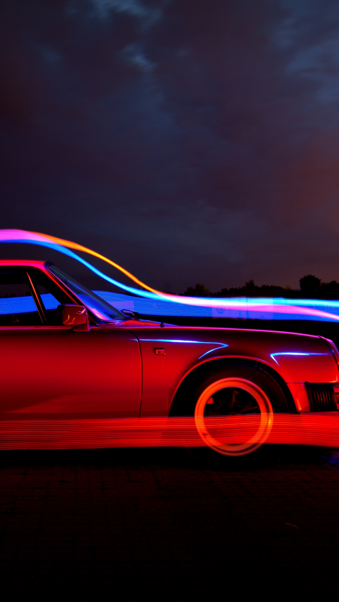 Red Coupe on Black Background. Wallpaper in 1080x1920 Resolution
