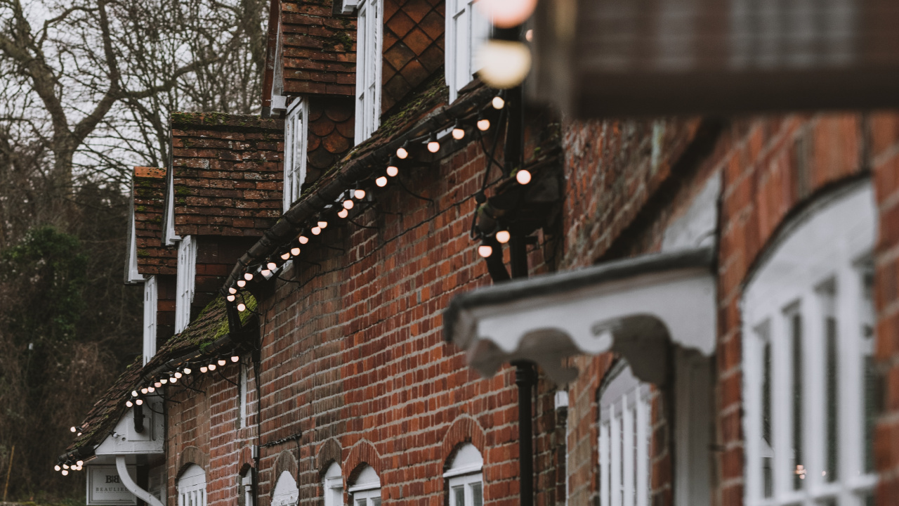 Brown and White Wooden House Near Trees During Daytime. Wallpaper in 1280x720 Resolution