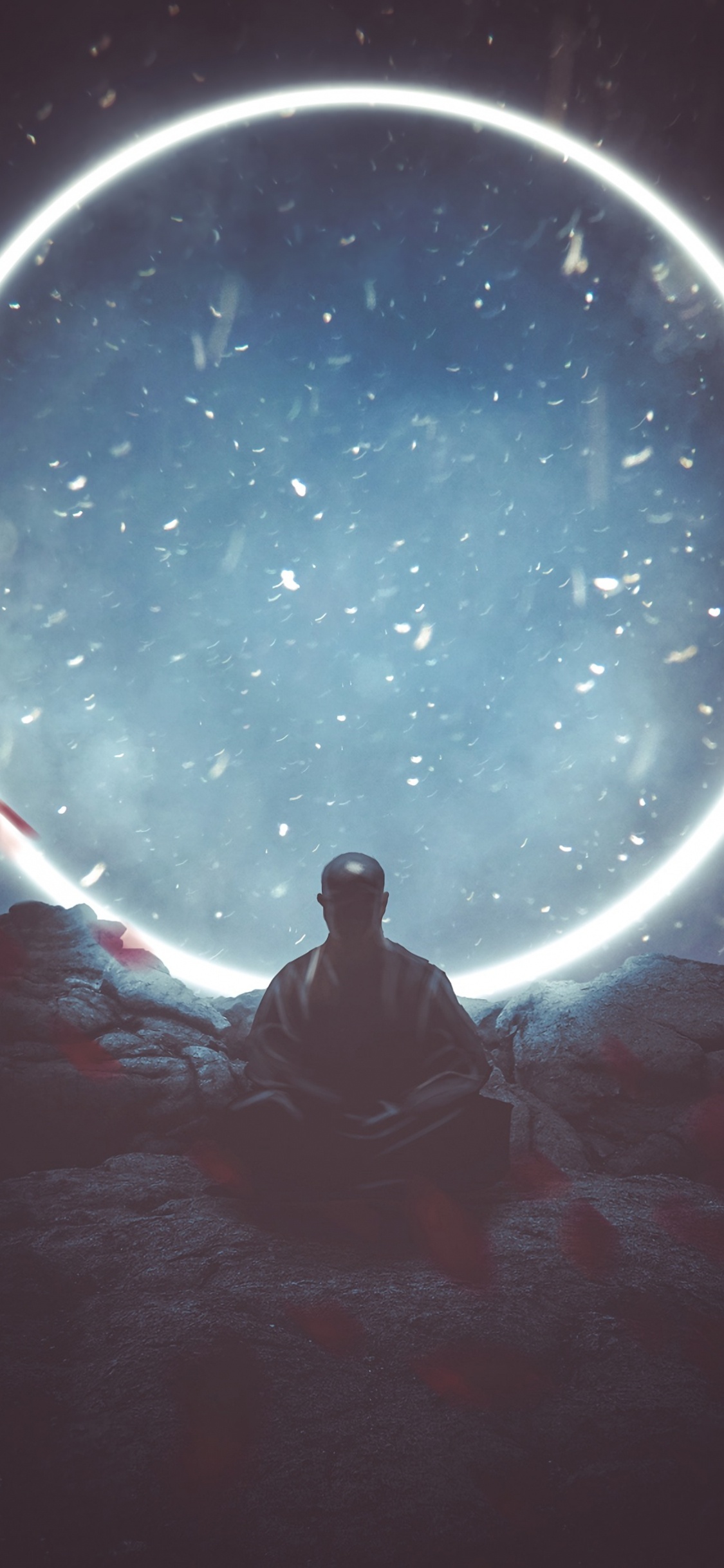 Silhouette of Man Sitting on Rock Under Starry Night. Wallpaper in 1125x2436 Resolution