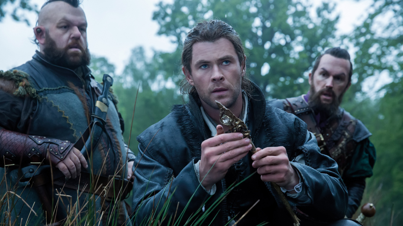 Mann in Blauer Jeansjacke Mit Brauner Und Schwarzer Schlange. Wallpaper in 1366x768 Resolution