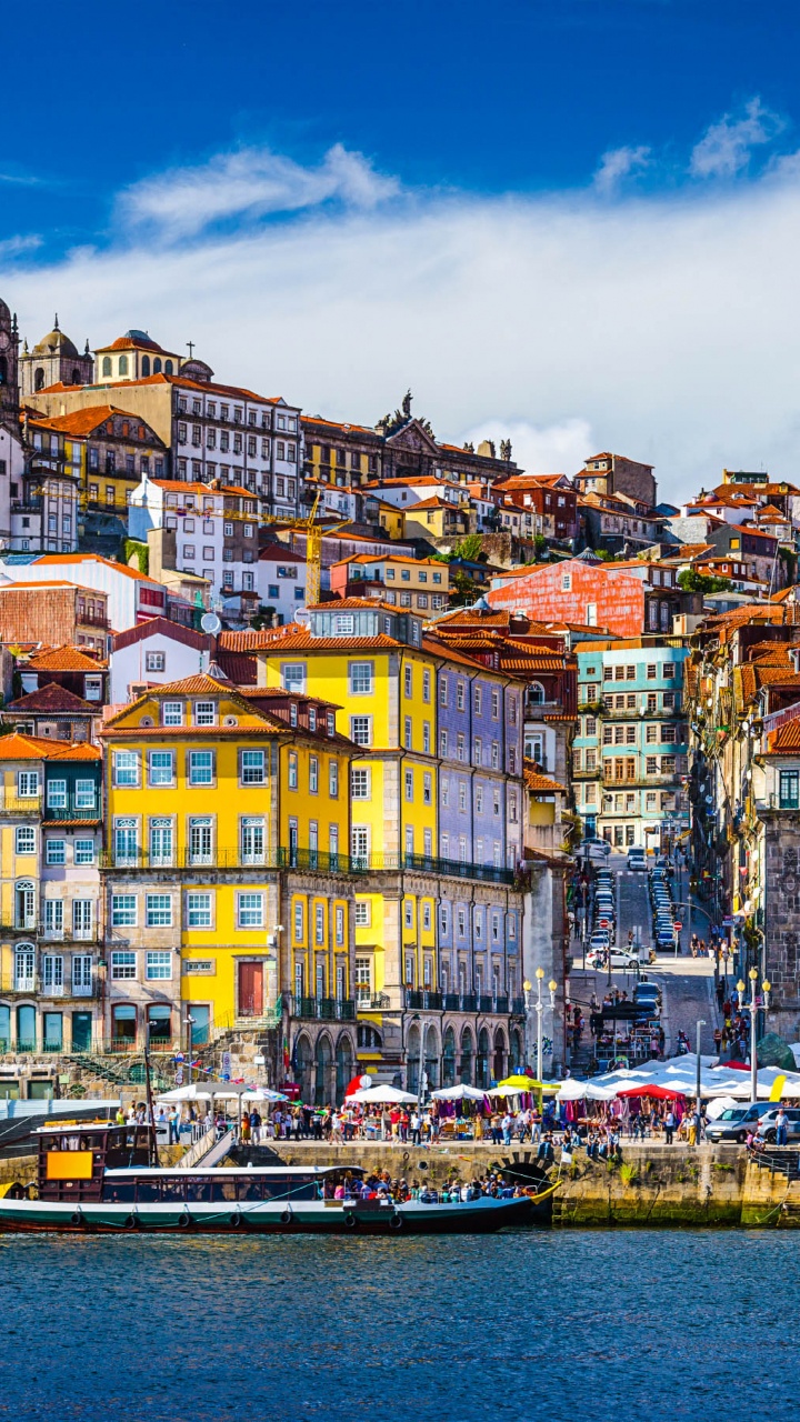 City Buildings Near Body of Water During Daytime. Wallpaper in 720x1280 Resolution