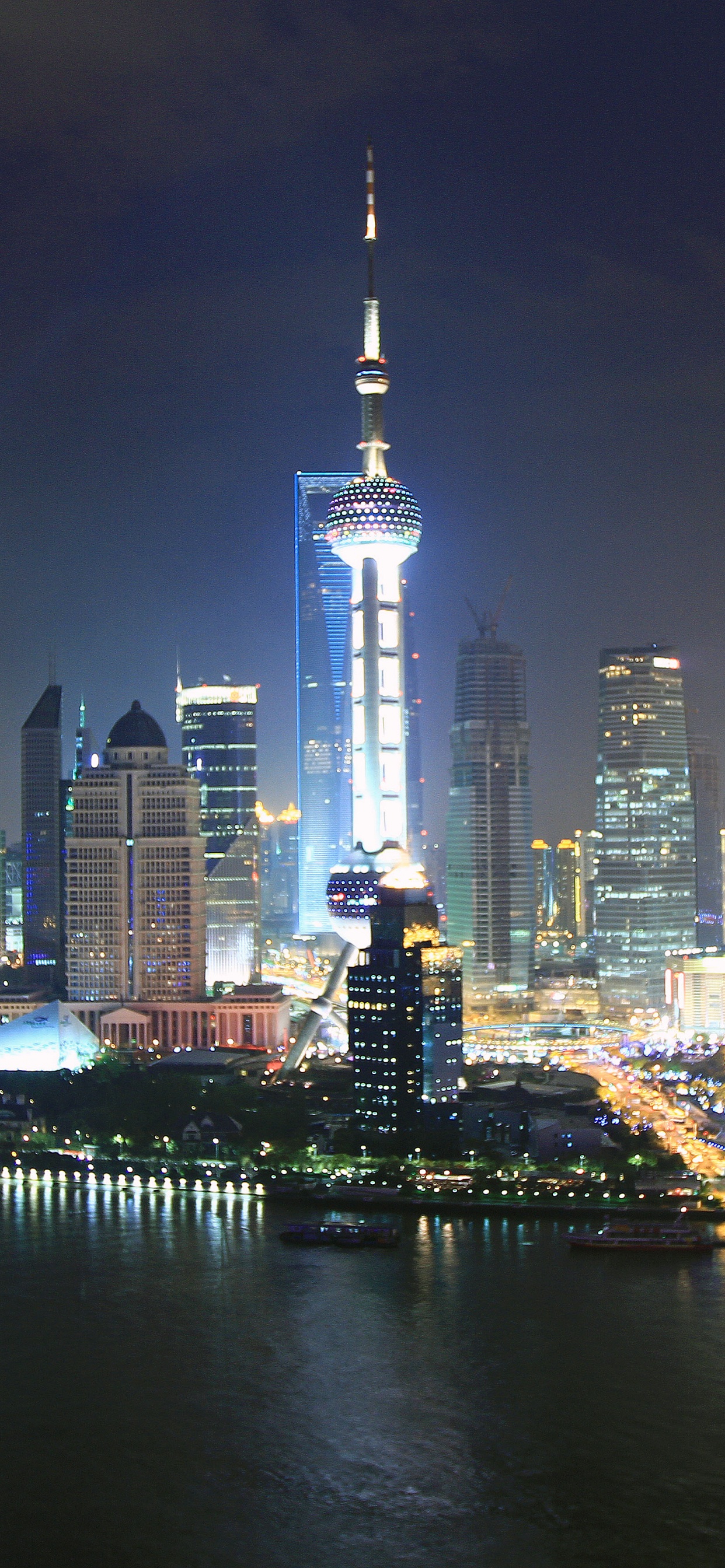 City Skyline During Night Time. Wallpaper in 1242x2688 Resolution