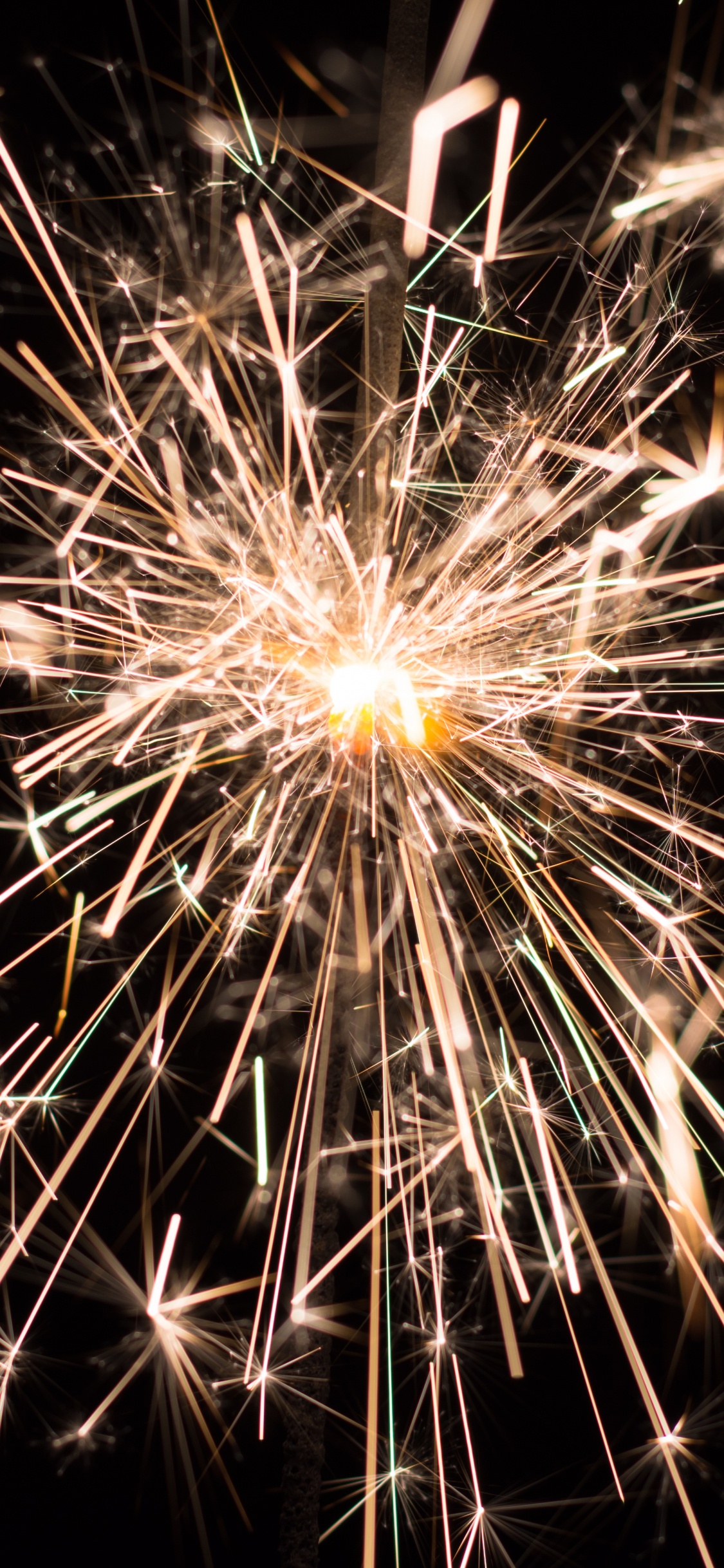 White and Yellow Fireworks in The Dark. Wallpaper in 1125x2436 Resolution