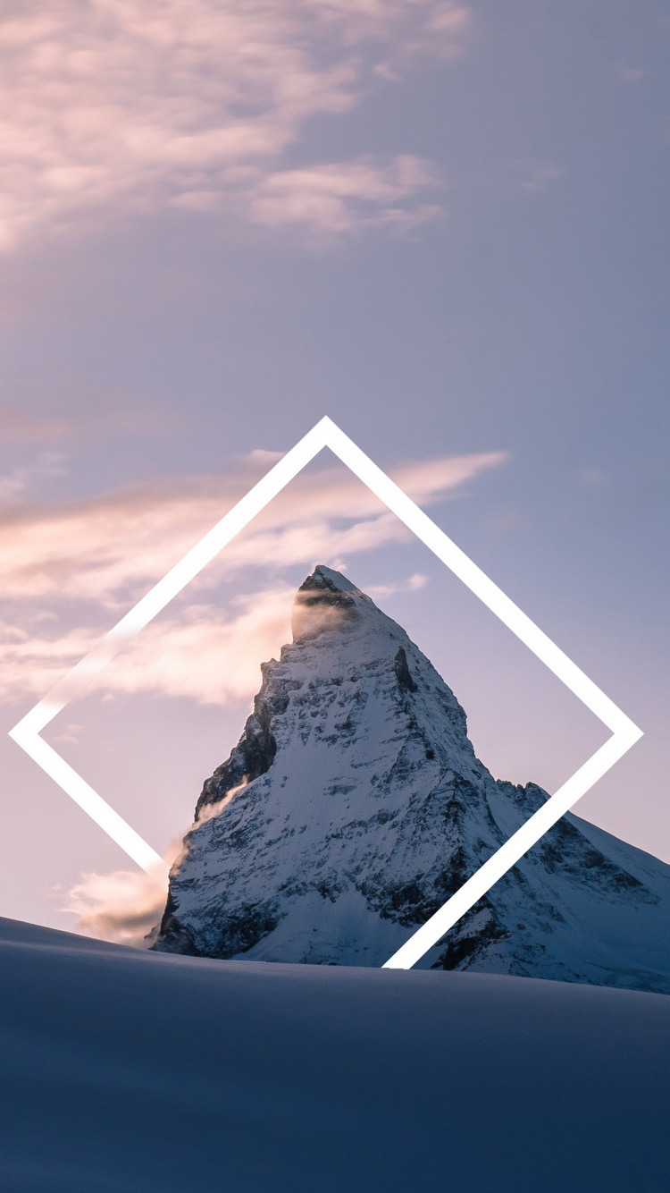 White Mountain Under White Clouds During Daytime. Wallpaper in 750x1334 Resolution