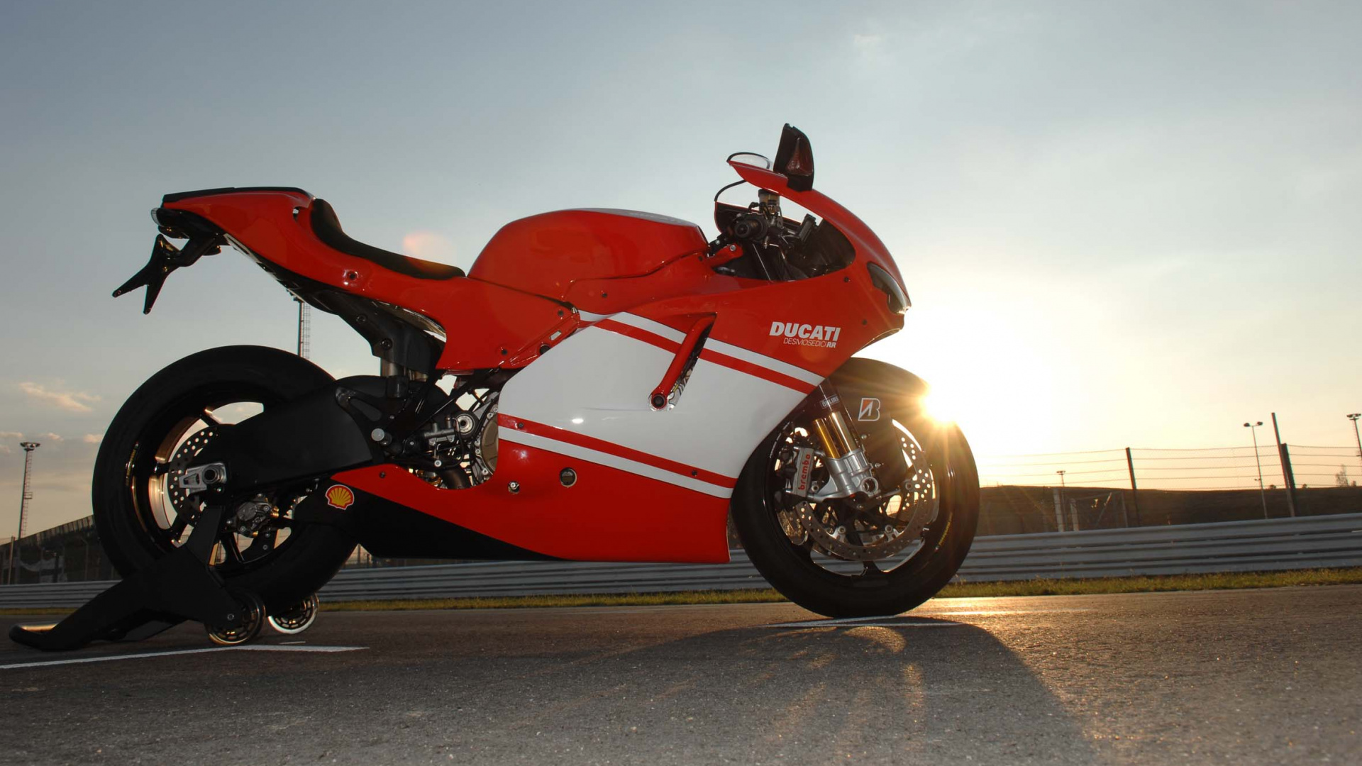 Red and Black Sports Bike on Road During Daytime. Wallpaper in 1920x1080 Resolution