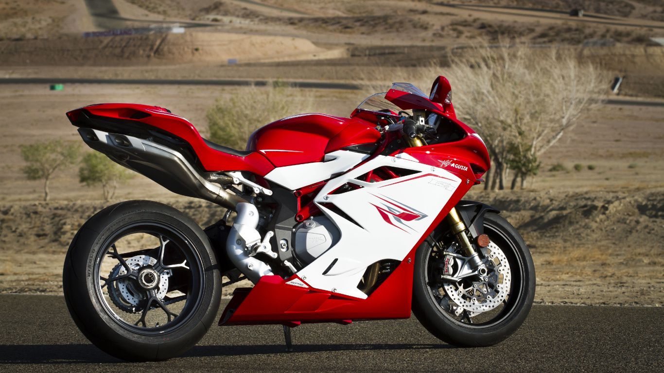 Vélo de Sport Rouge et Blanc Sur Route Pendant la Journée. Wallpaper in 1366x768 Resolution
