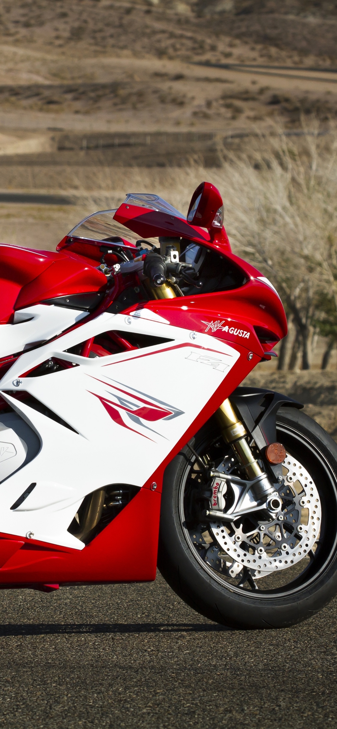Red and White Sports Bike on Road During Daytime. Wallpaper in 1125x2436 Resolution