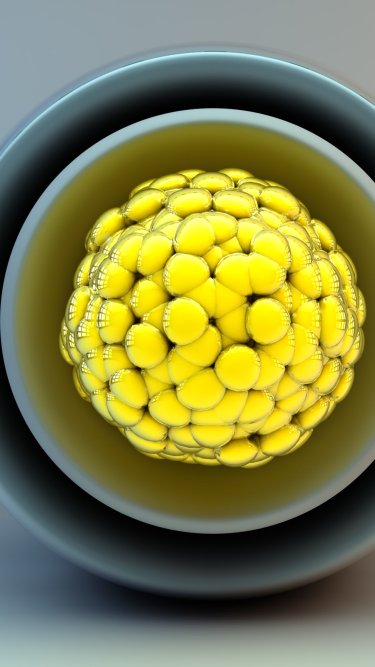 Gelbe Perlen in Weißer Und Blauer Keramikschale. Wallpaper in 750x1334 Resolution