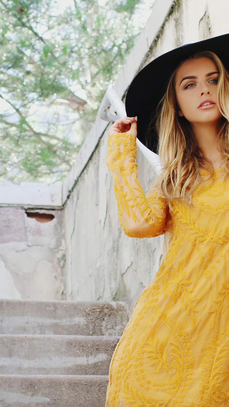 Marina Laswick Hat, Nose, Hat, Mouth, Yellow. Wallpaper in 750x1334 Resolution