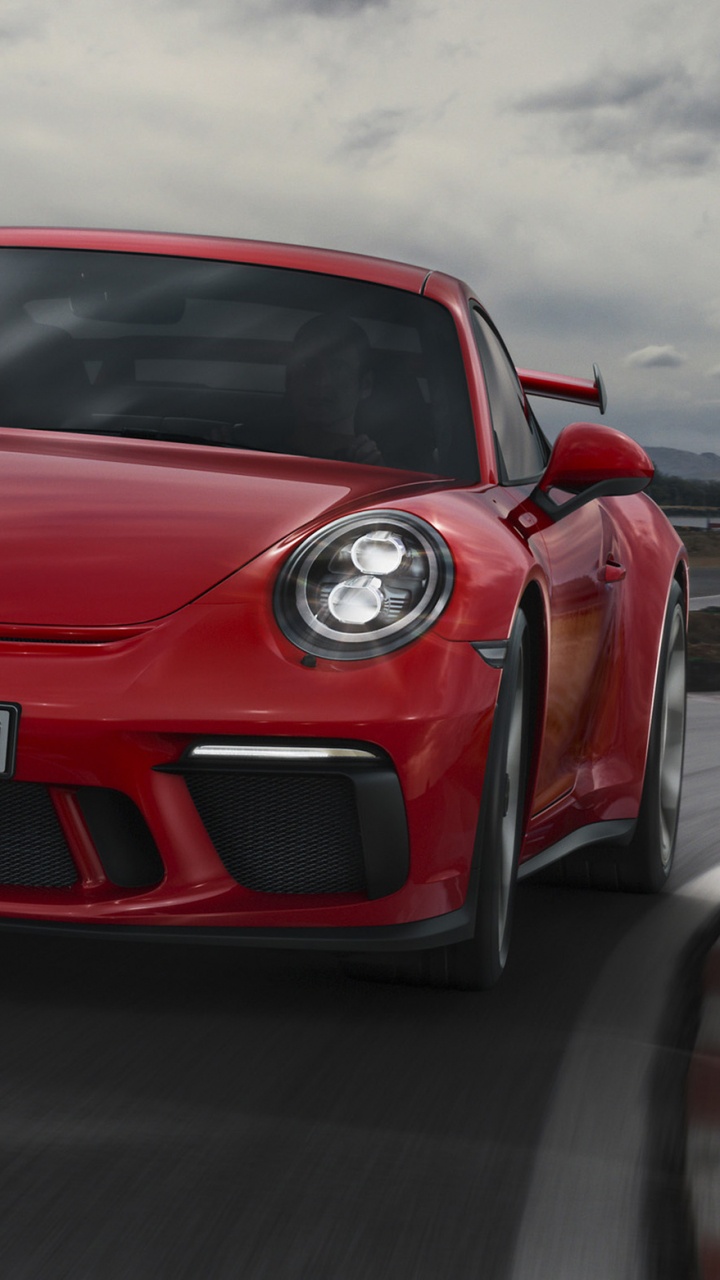 Roter Porsche 911 Unterwegs. Wallpaper in 720x1280 Resolution