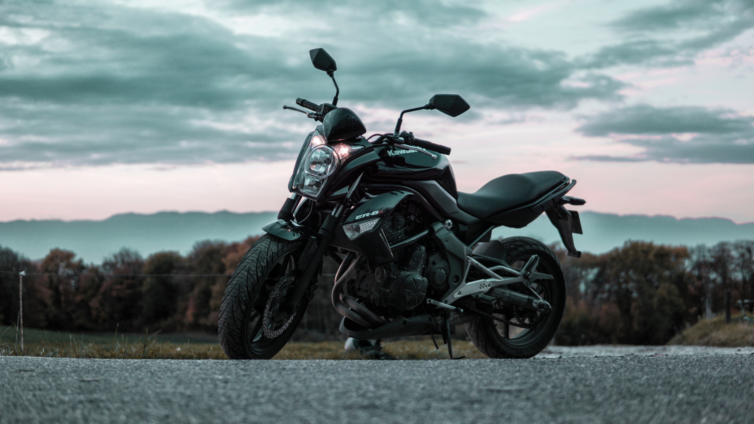 Black and Gray Motorcycle on Gray Asphalt Road During Daytime. Wallpaper in 2560x1440 Resolution
