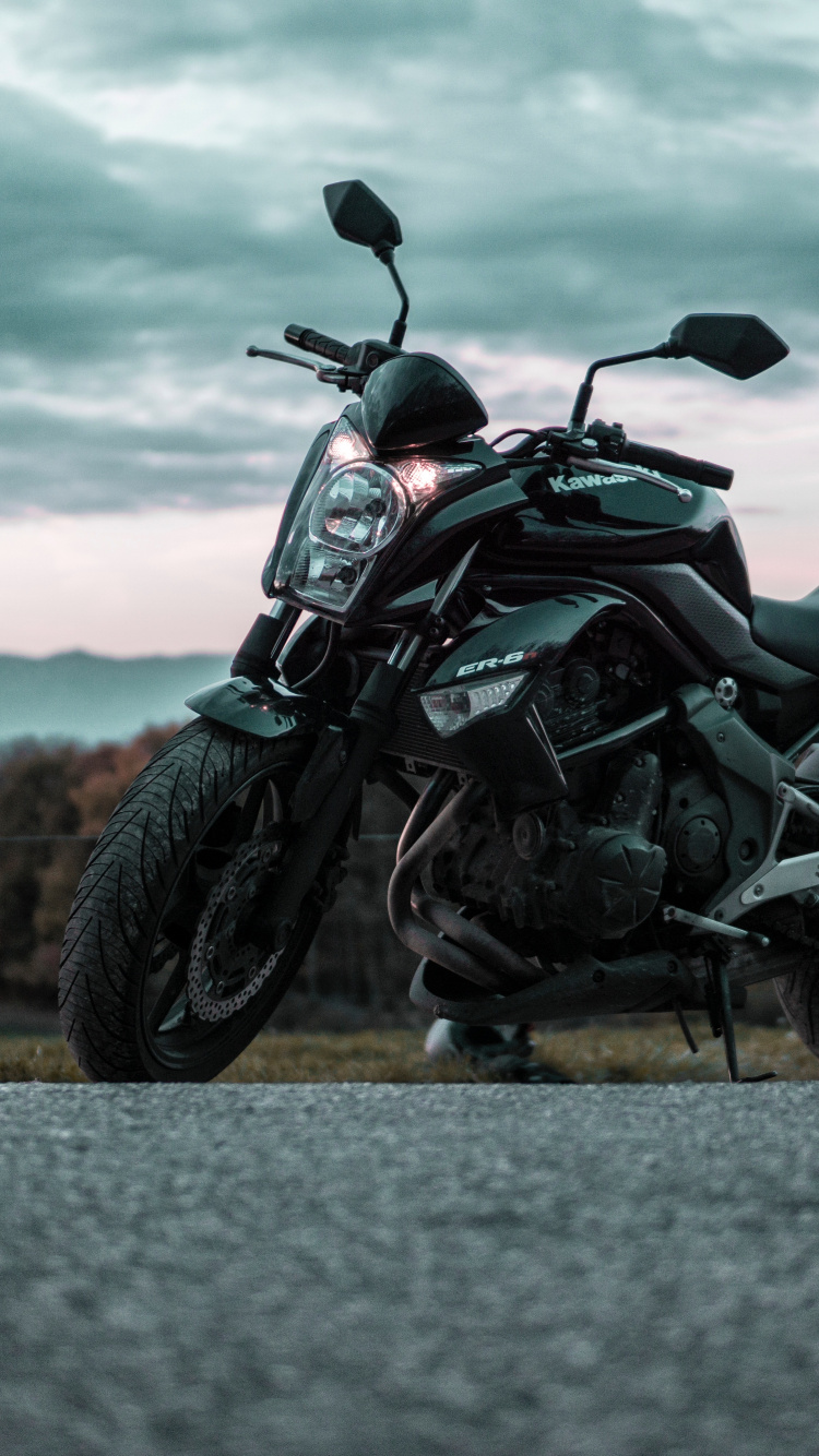 Black and Gray Motorcycle on Gray Asphalt Road During Daytime. Wallpaper in 750x1334 Resolution