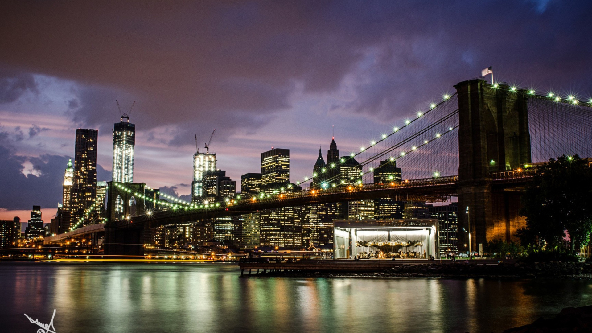 Lighted Bridge Over River During Night Time. Wallpaper in 1920x1080 Resolution