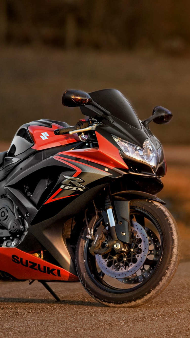 Red and Black Sports Bike on Road During Daytime. Wallpaper in 750x1334 Resolution