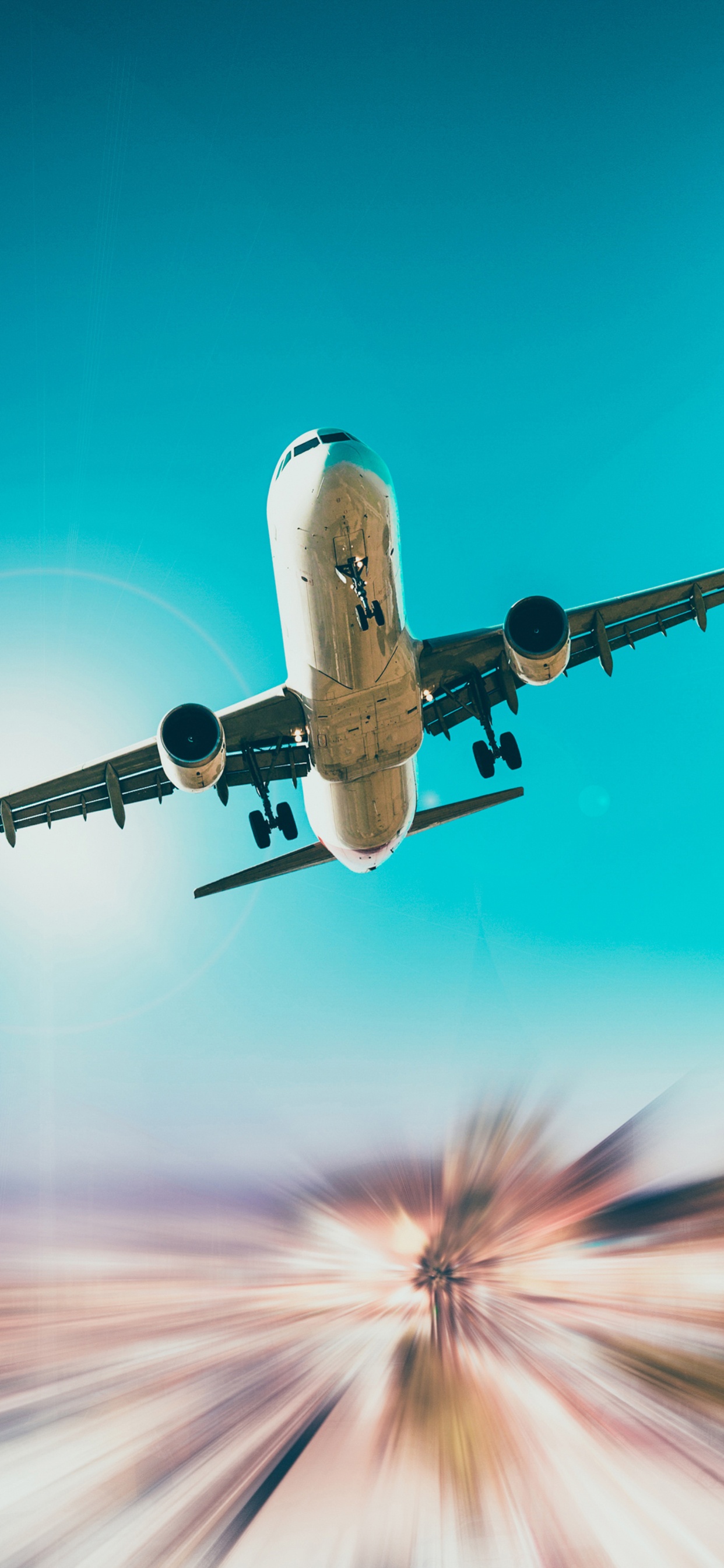White and Blue Airplane in Flight. Wallpaper in 1242x2688 Resolution