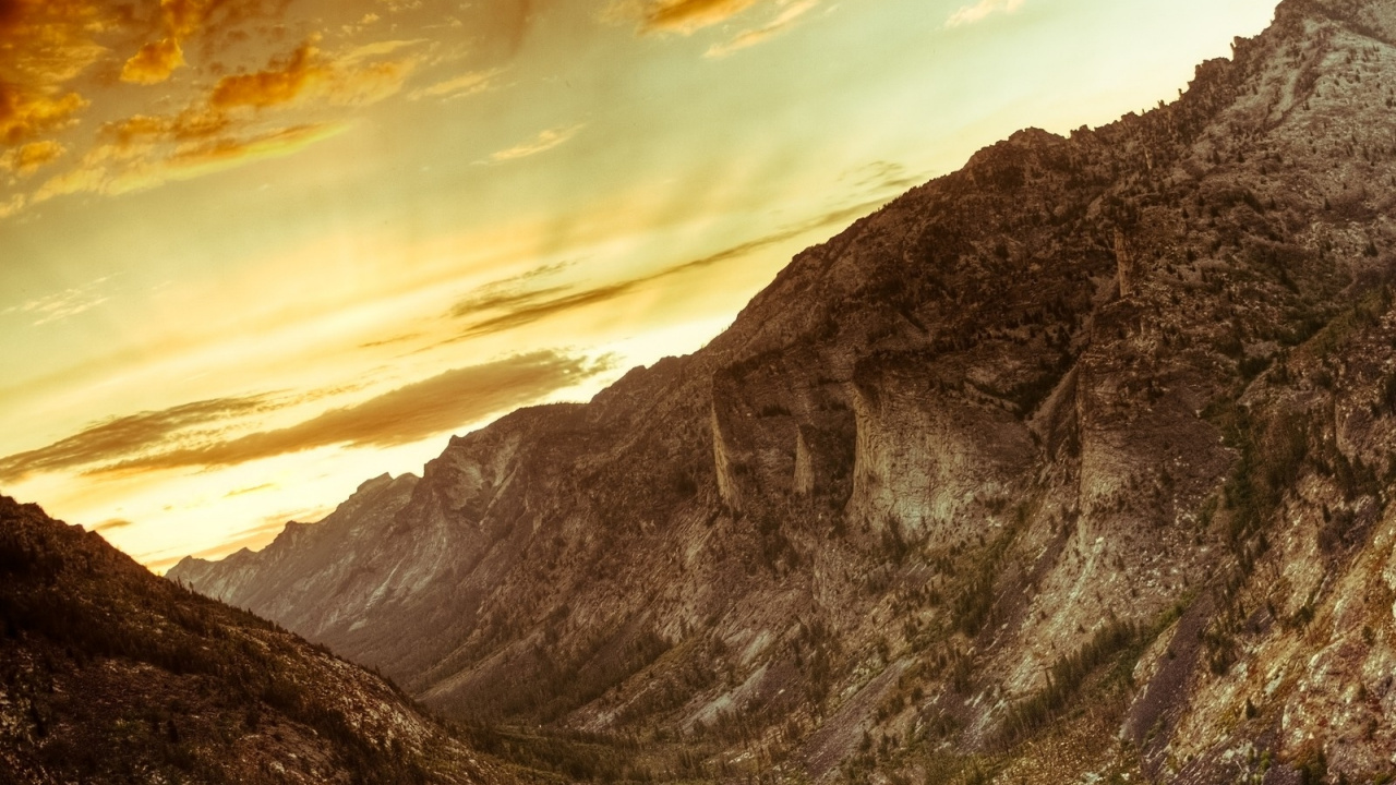 Gray and Brown Mountain Under Cloudy Sky During Daytime. Wallpaper in 1280x720 Resolution