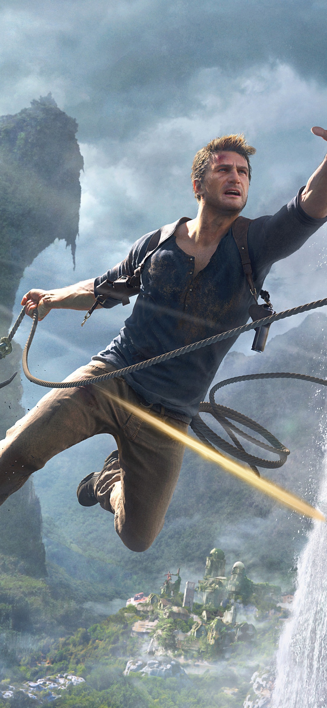 Man in Black Jacket and Blue Denim Jeans Holding Stick With Fire. Wallpaper in 1125x2436 Resolution