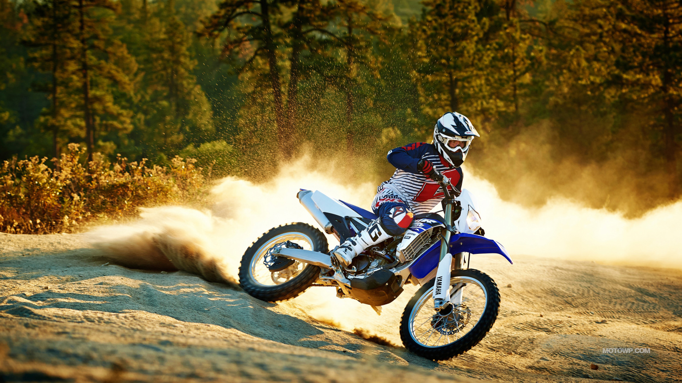 Man Riding Motocross Dirt Bike on Dirt Road During Daytime. Wallpaper in 1366x768 Resolution