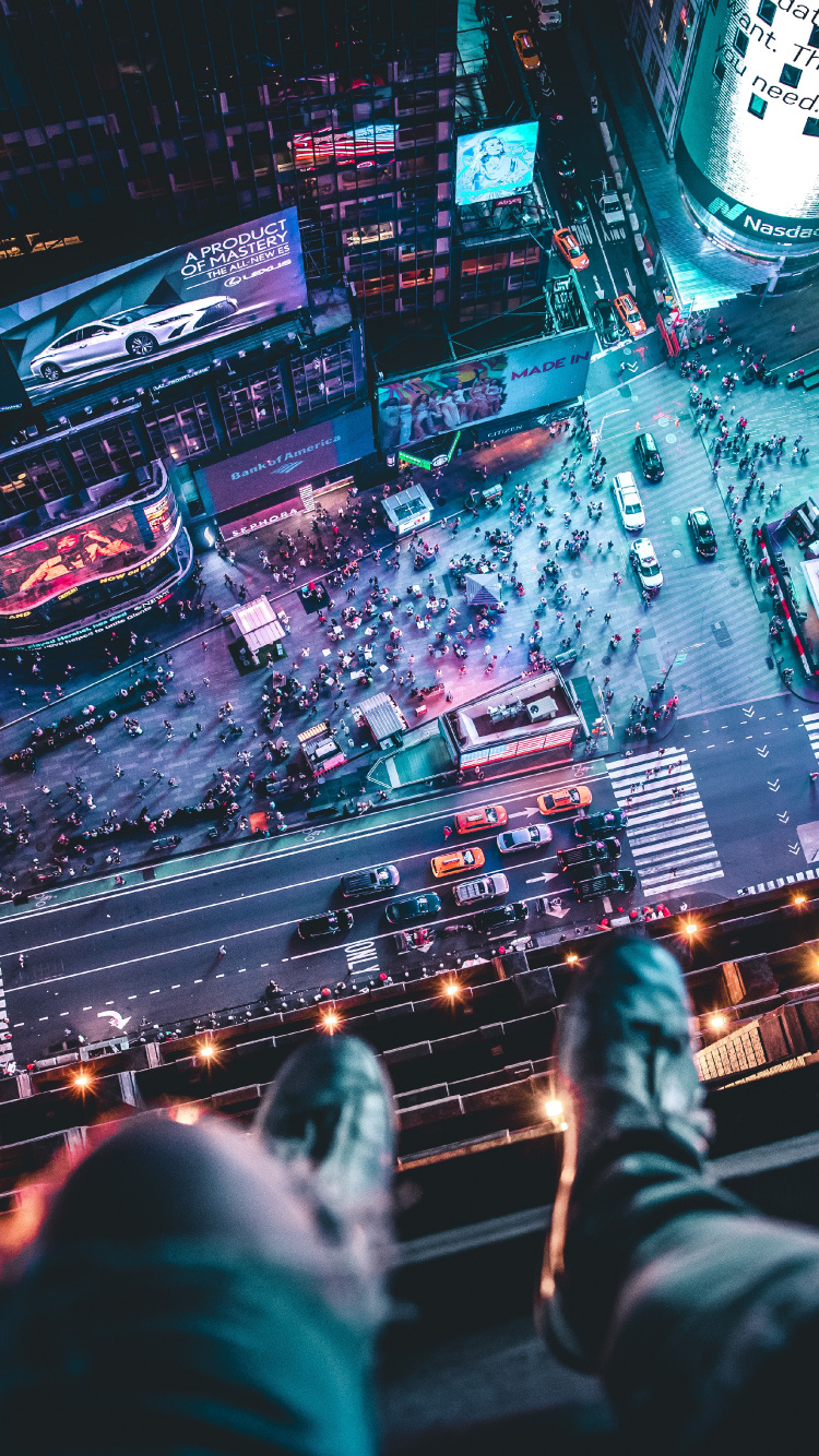 People Walking on Street During Night Time. Wallpaper in 750x1334 Resolution