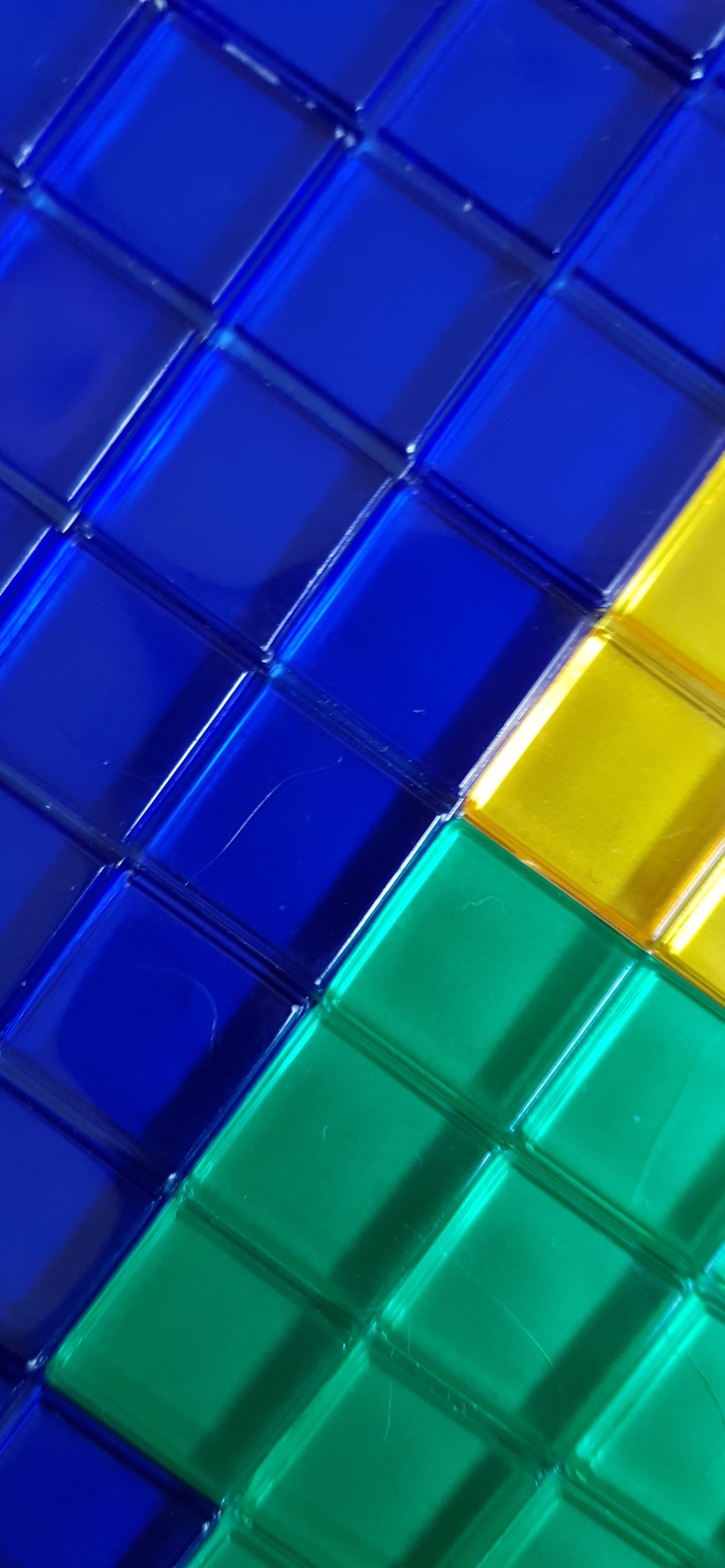 Blue Yellow and Green Plastic Blocks. Wallpaper in 1242x2688 Resolution