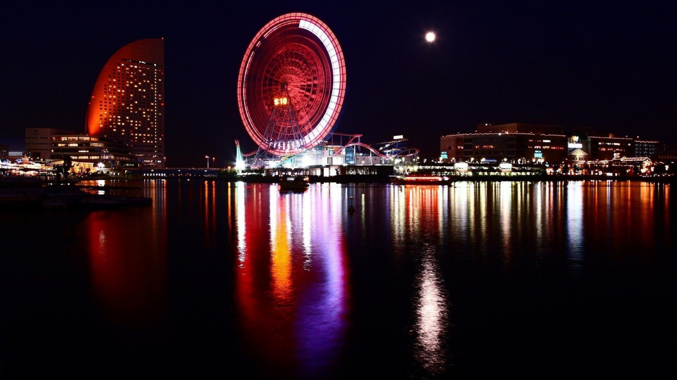 Ferris Wheel Near Body of Water During Night Time. Wallpaper in 1366x768 Resolution