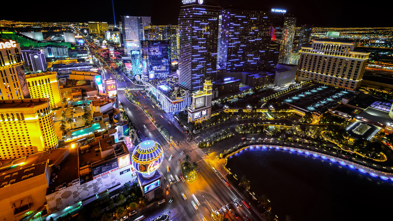 City With High Rise Buildings During Night Time. Wallpaper in 1366x768 Resolution