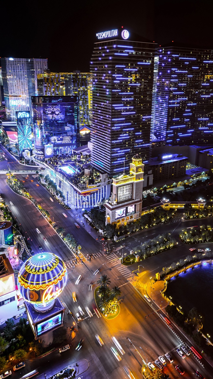 City With High Rise Buildings During Night Time. Wallpaper in 720x1280 Resolution