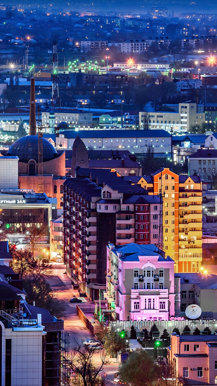 Aerial View of City Buildings During Night Time. Wallpaper in 720x1280 Resolution