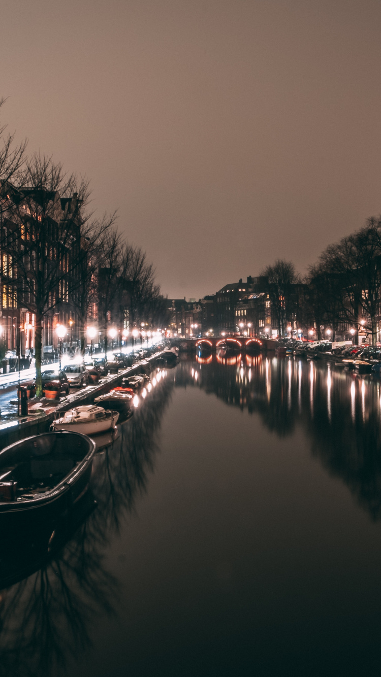 Boat on River During Night Time. Wallpaper in 750x1334 Resolution