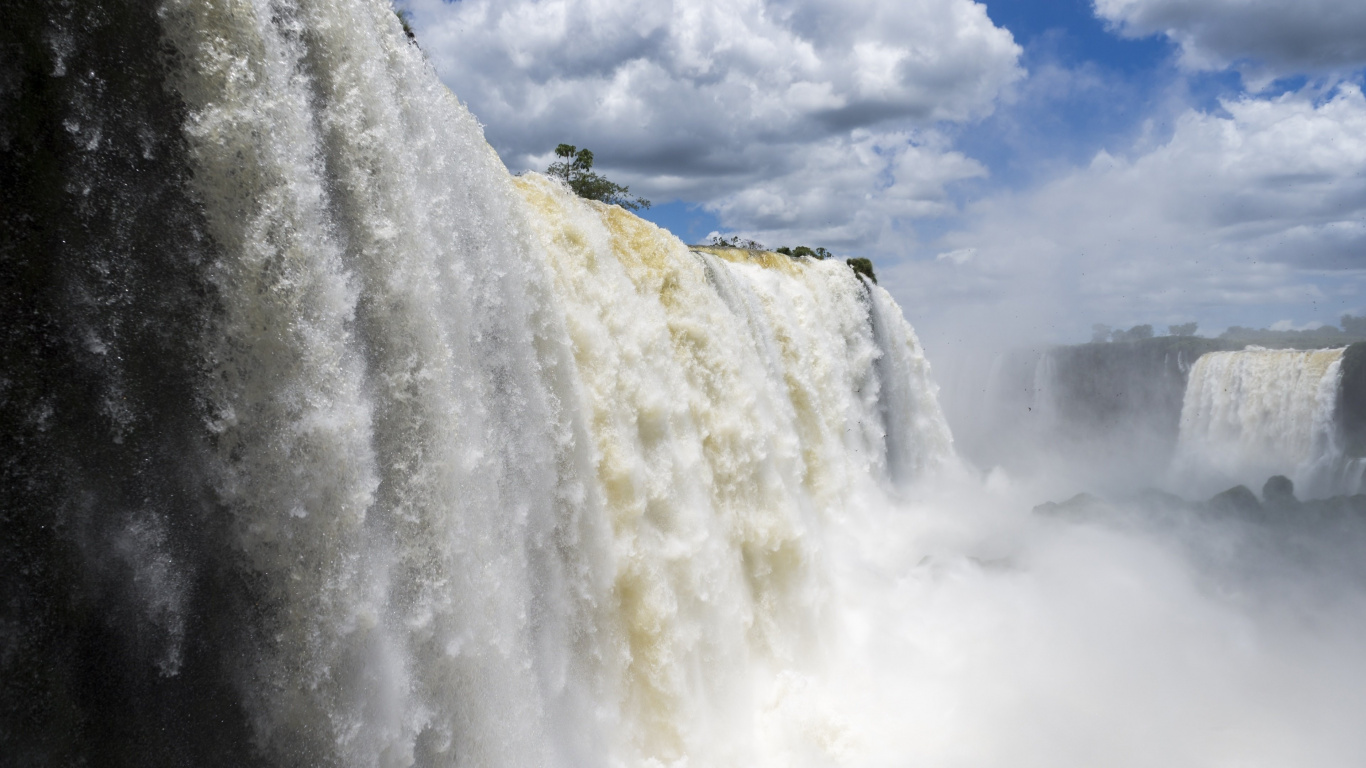 Waterfalls Under Cloudy Sky During Daytime. Wallpaper in 1366x768 Resolution