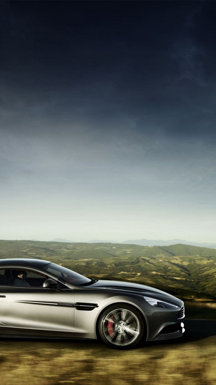 Silver Coupe on Gray Asphalt Road During Daytime. Wallpaper in 720x1280 Resolution