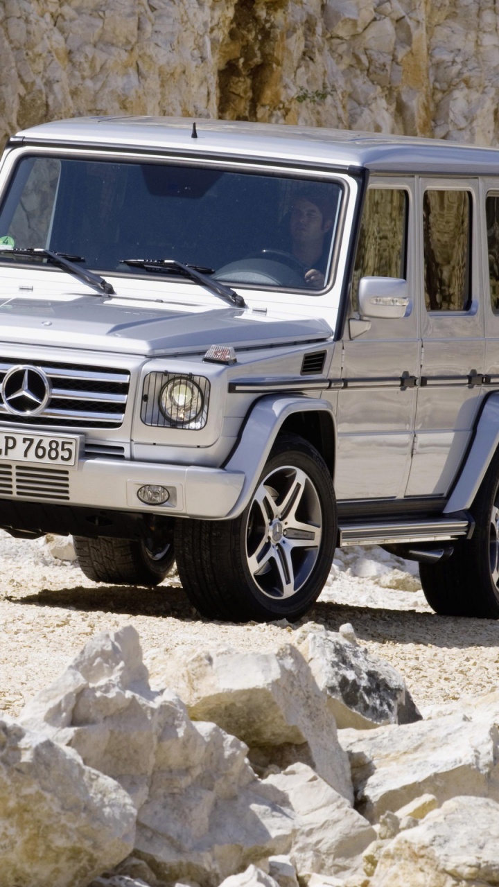 White Jeep Wrangler on Rocky Road During Daytime. Wallpaper in 720x1280 Resolution