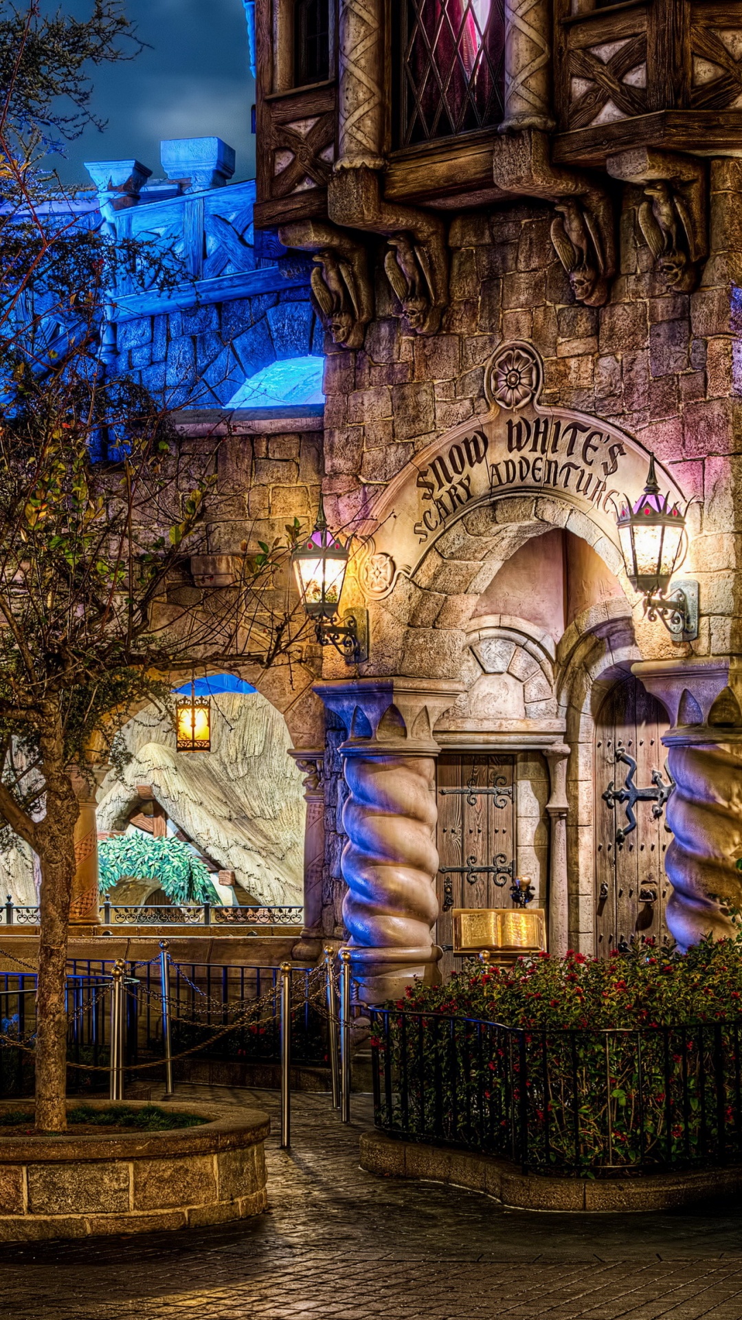 Purple and White Concrete Building Near Trees During Night Time. Wallpaper in 1080x1920 Resolution