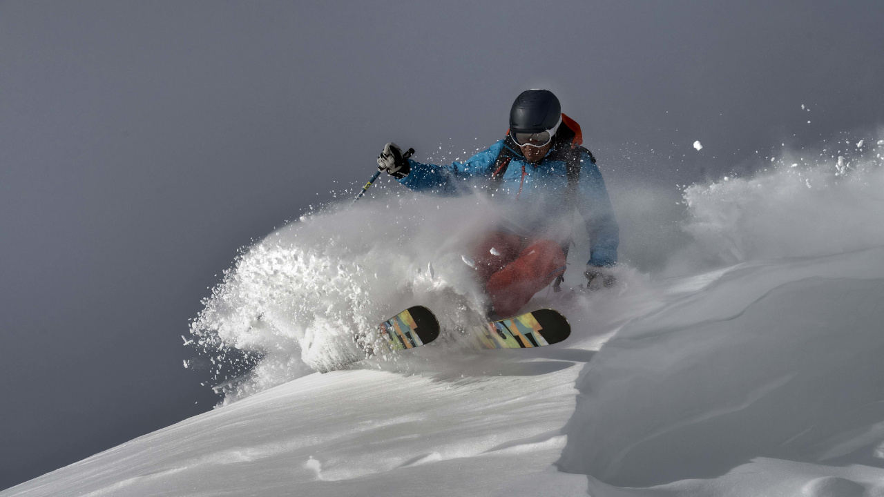 Man Riding on Red and White Snow Mobile During Daytime. Wallpaper in 1280x720 Resolution