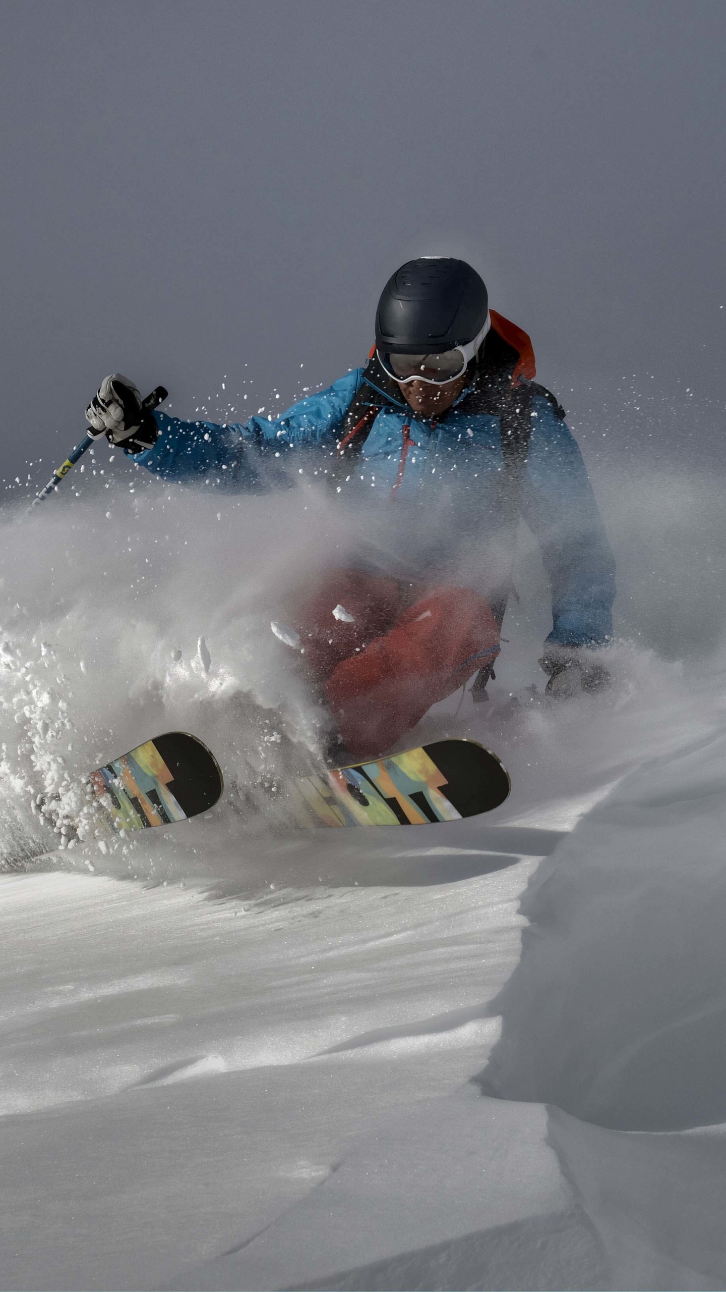 Man Riding on Red and White Snow Mobile During Daytime. Wallpaper in 1440x2560 Resolution