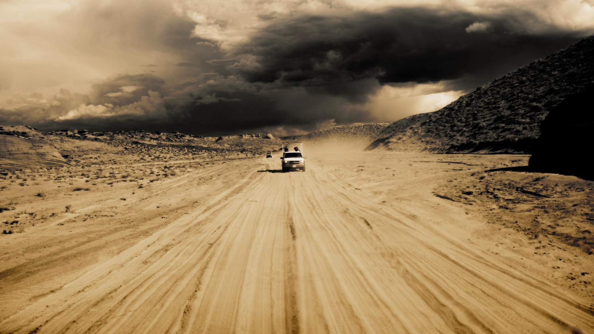 White Car on Brown Sand Under Cloudy Sky During Daytime. Wallpaper in 1920x1080 Resolution